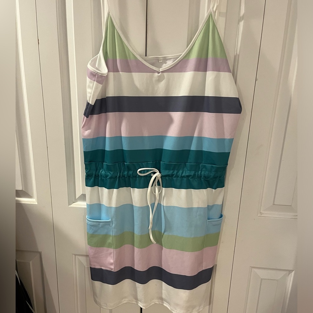 Striped dress with pockets and tie straps.